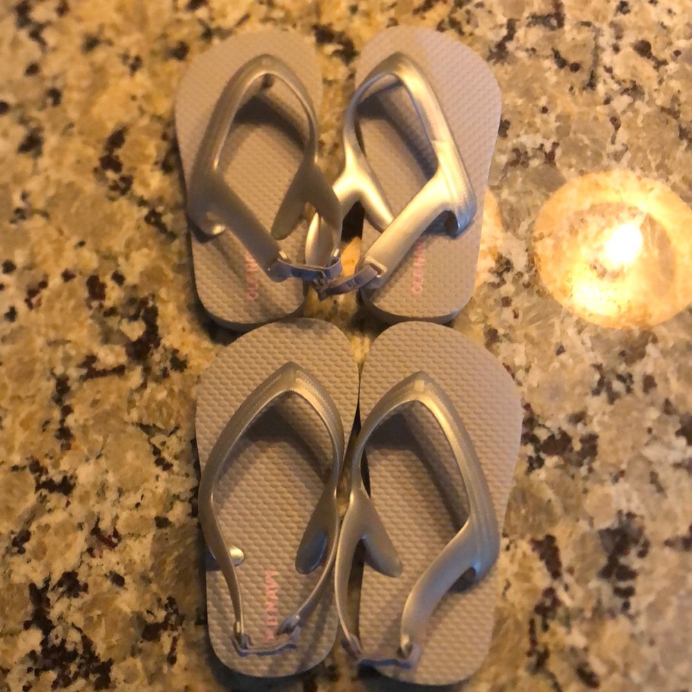 Never worn size 7 silver toddler flip-flops